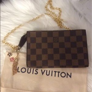 Authentic Louis Vuitton wristlet/clutch